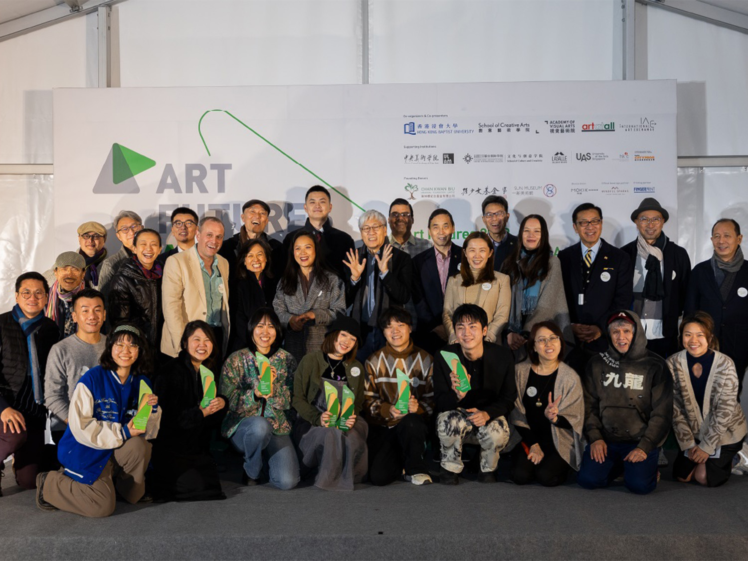 A group of international and local judges, awardees, and professors at the opening of the awardees exhibition, which attracted a total of 145 guests.